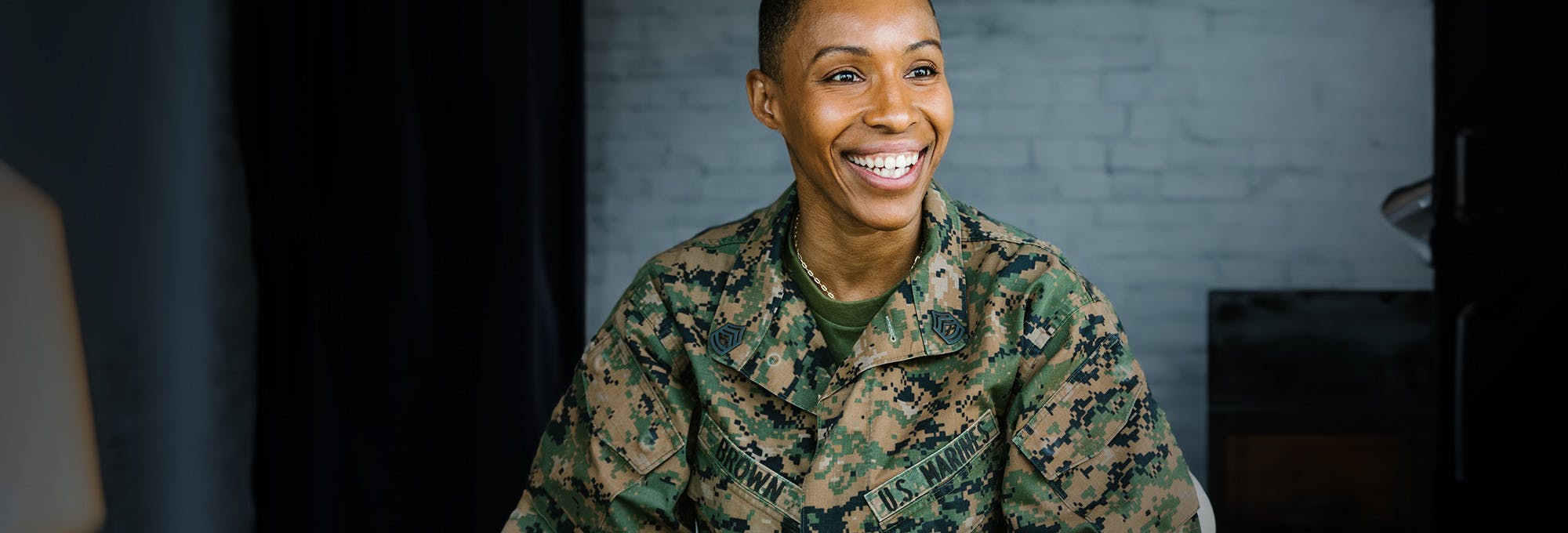 Female marine and veteran smiling 