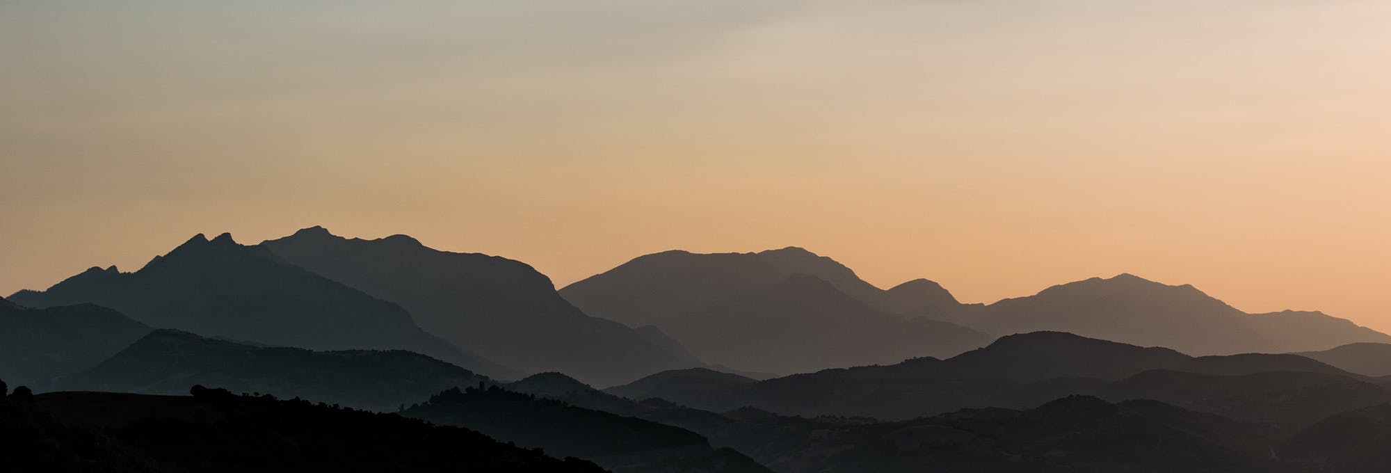 Mountains during sunset representing logarithmic regression