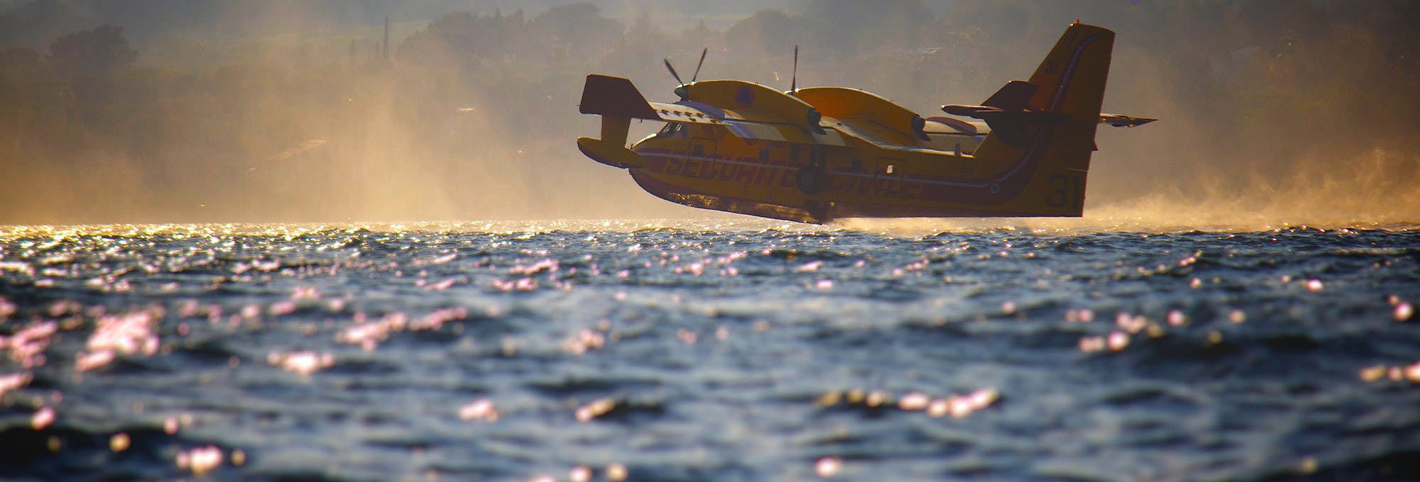 A sea plane flying right over the surface of water which represents the fundamental theorem of calculus
