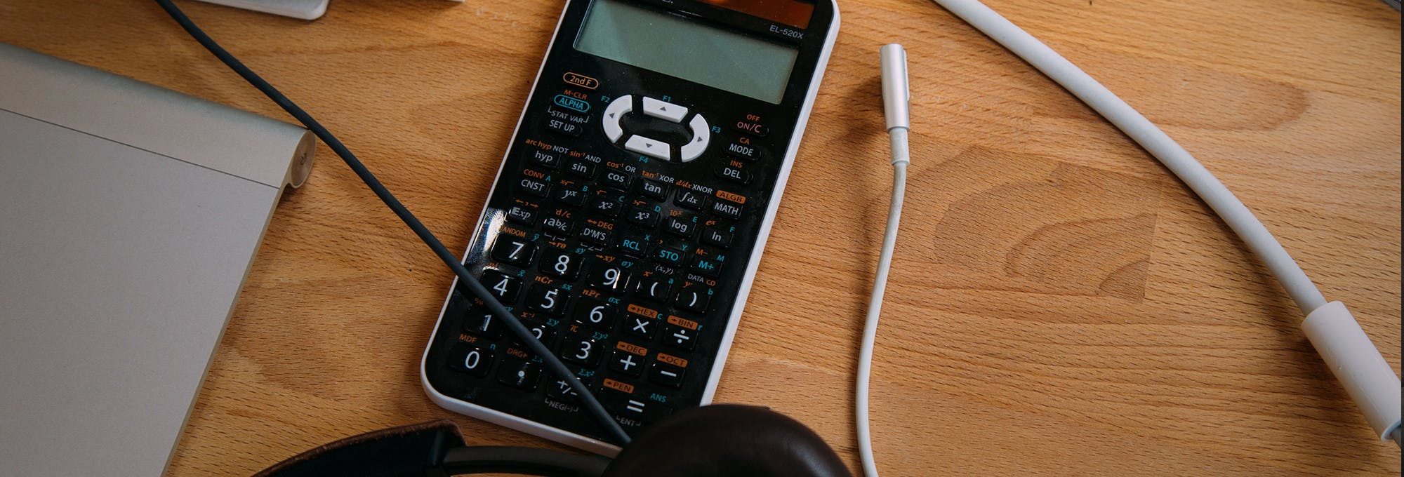 calculator on a computer desk 