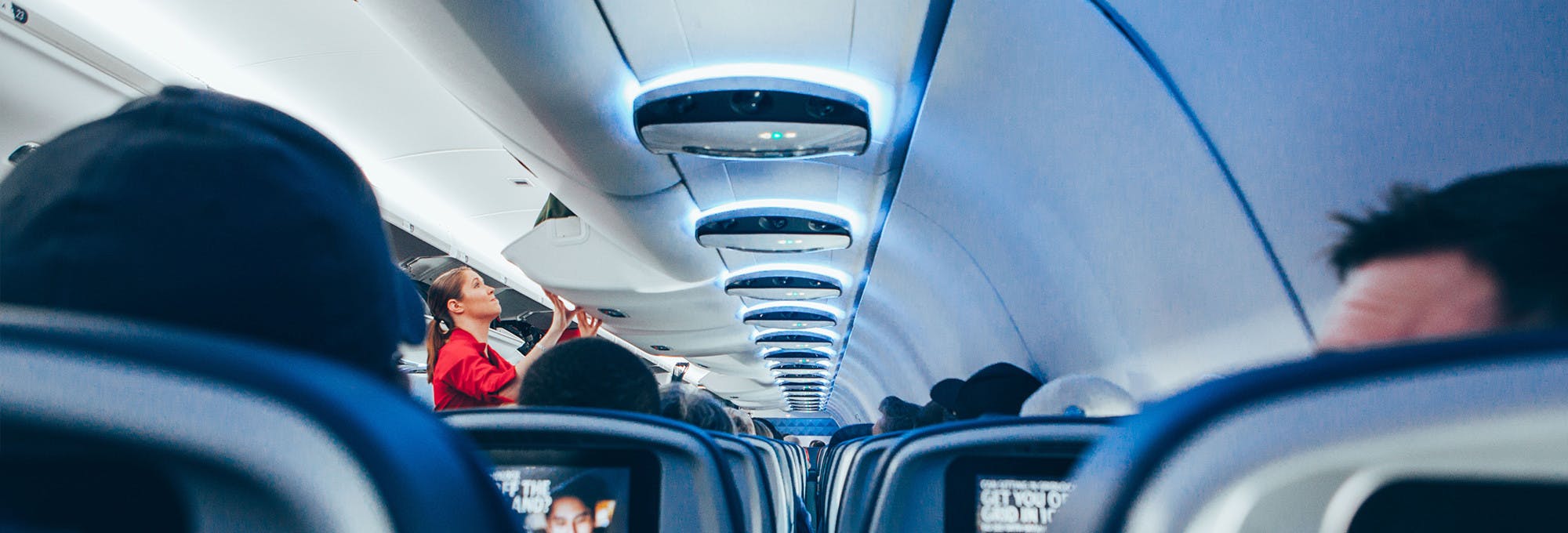 Inside an airplane from a passenger seat viewpoint