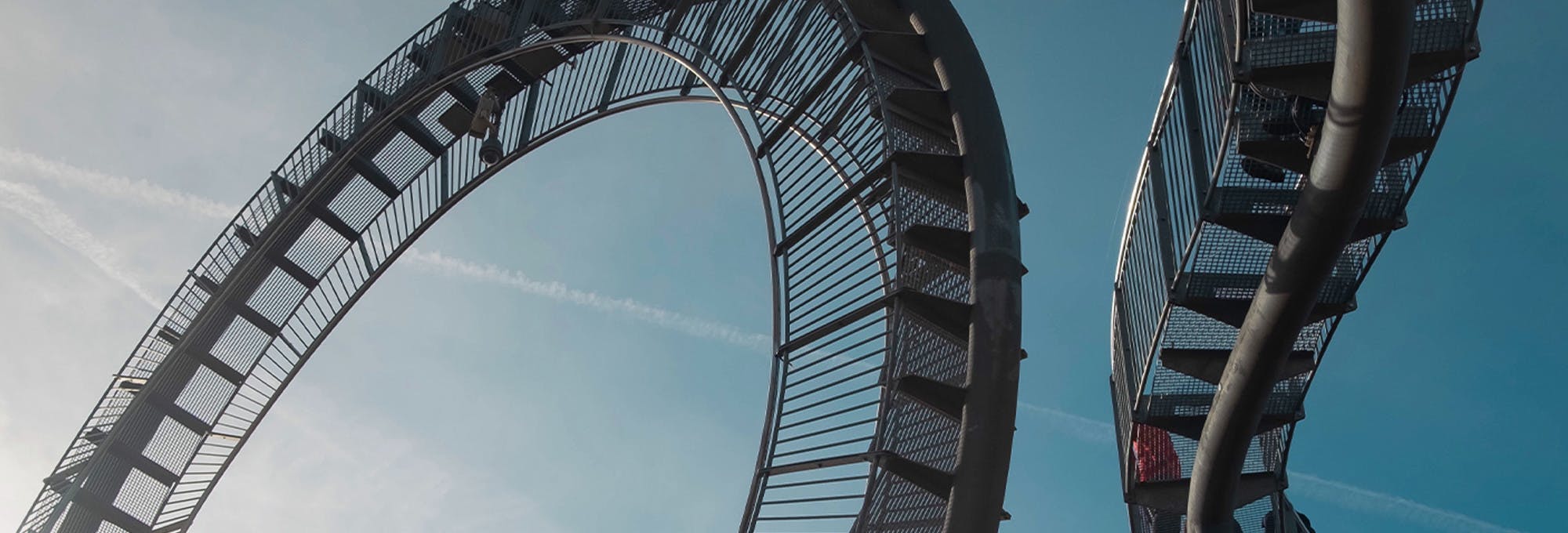 Rollercoaster curving through the sky HIGH RES