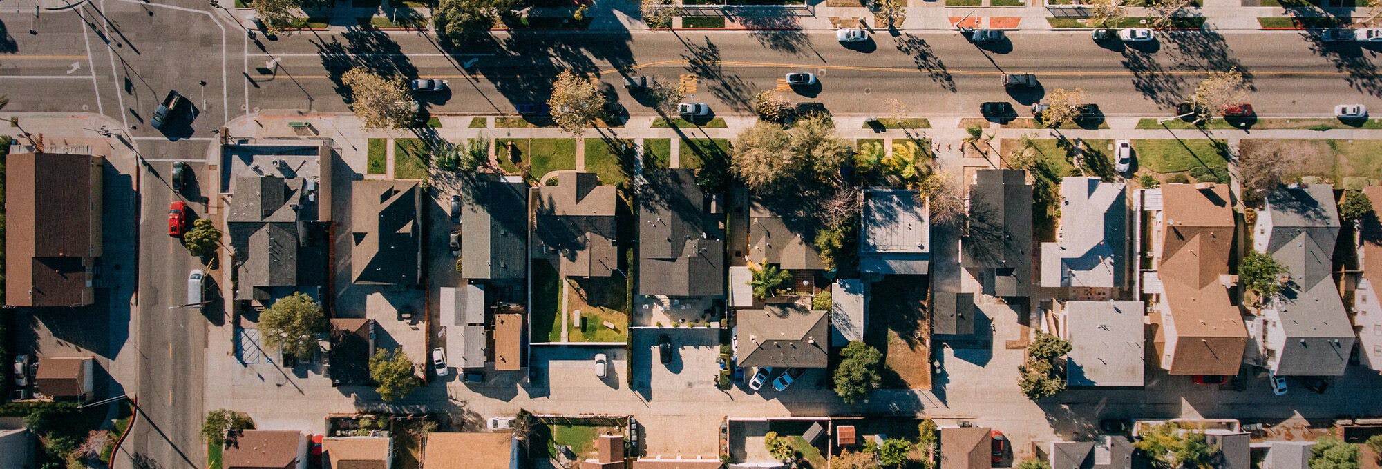 overview aerial shot of homes for illustrating midpoint method 