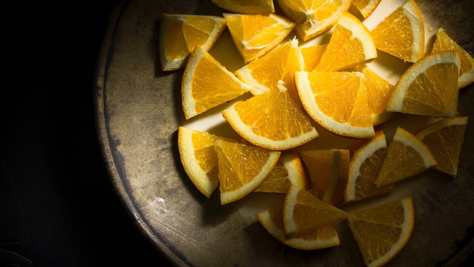 Evenly sliced oranges which help represent math and fractions
